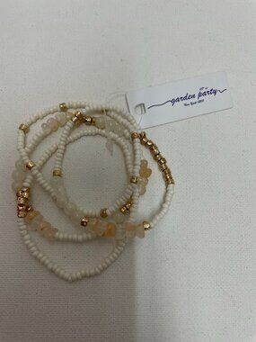 garden party stretch 4 tier bracelet w/white beads and gold nuggets